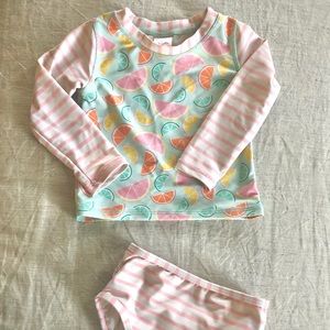 Ruffle Butts two piece swimsuit.